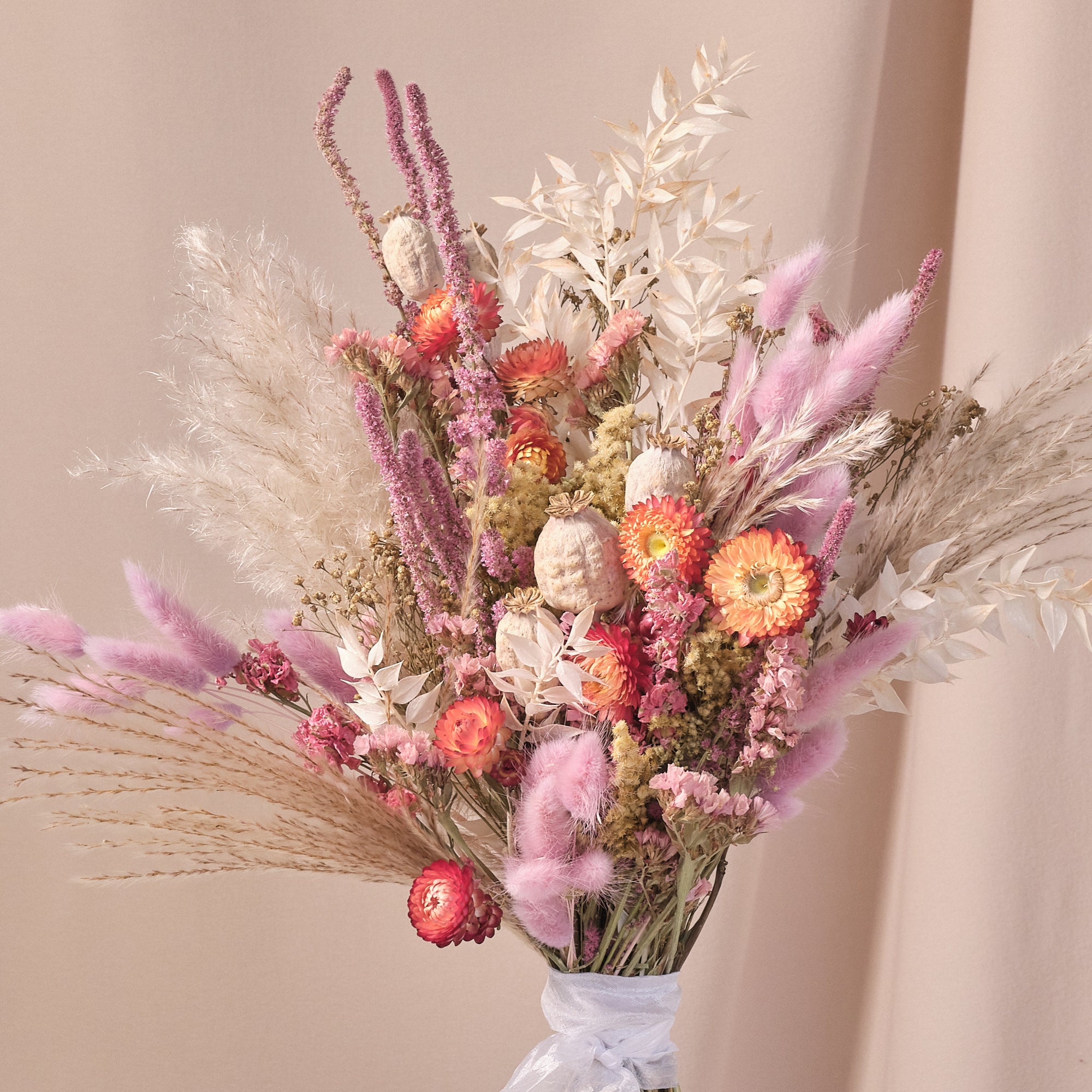 dried flower wedding bouquet, dried flower brides bouquet in pinks, orange and creams, by botanique workshop, wedding florist in London